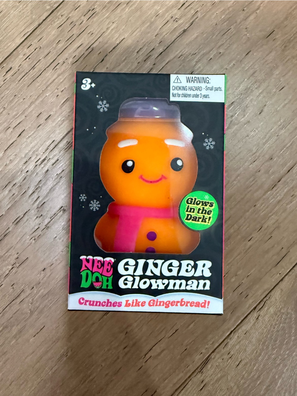 NeeDoh Ginger Glowman - Orange with pink scarf.